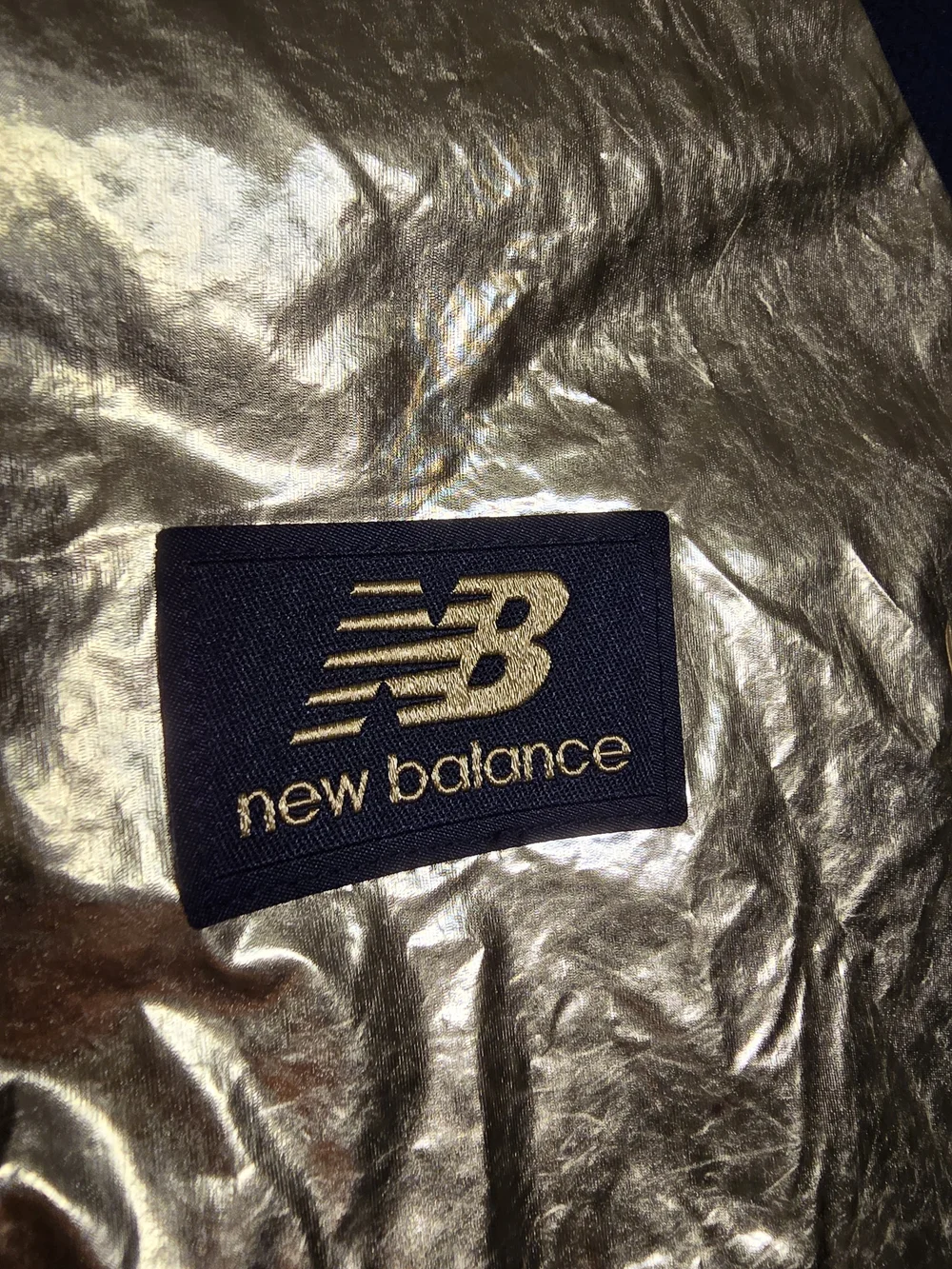 NWT New Balance Athletics Podium Shine Windbreaker Jacket